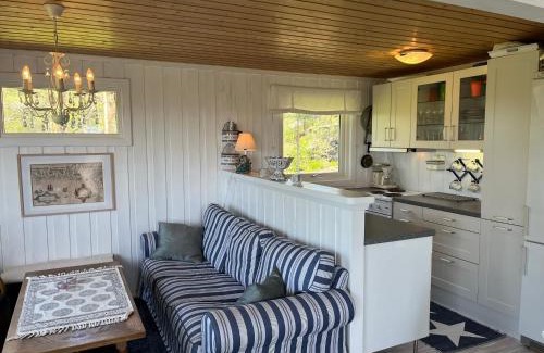 Fredrikstad House | Lys og koselig hytte med flott utsikt og masse sol