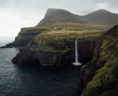 Gasadalur House | Múlafossur Cottages by famous waterfall in Gásadalur