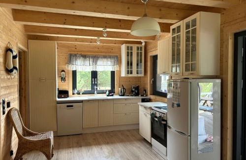 Czarny Mlyn House | Młyńska Chata - drewniany, całoroczny dom w sosnowym lesie