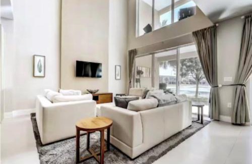 Almont House | Magic Village Townhouse, Minutes from Disney, Pool, Grill
