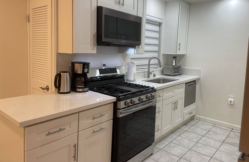 Downtown Apartment | Magnificent 2-Bd 2-Bath on tree-lined residential street near city center.