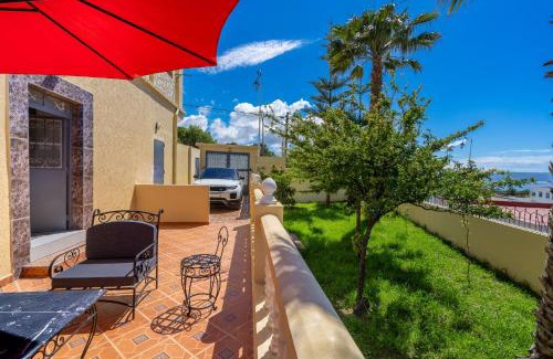 Mnar House | Magnifique appartement avec jardin en face de la mer