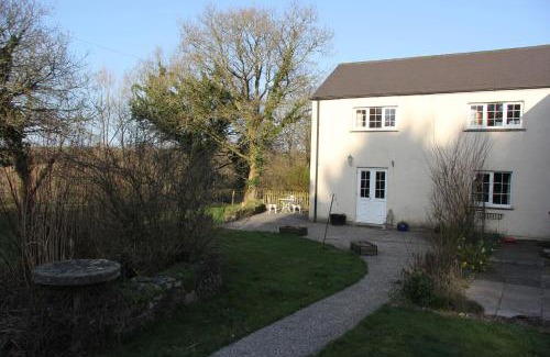 St. Giles on the Heath House | Magnolia Cottage