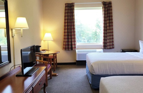Malone Hotel | Magnuson Hotel West Liberty