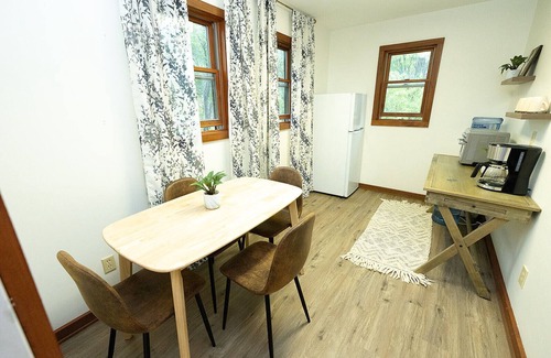 East Jordan Cabin | Main cabin + sleeping bunkhouse, heated inground pool & u-shaped driveway.