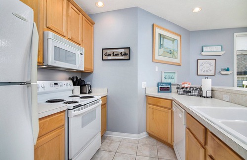 Manistee Condo | Main Floor Poolside Retreat
