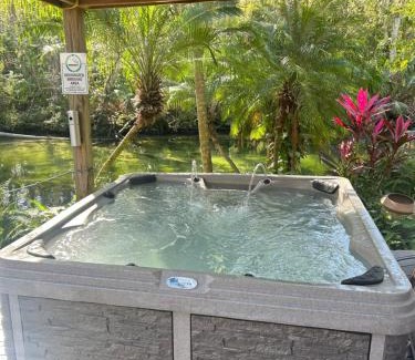 Weeki Wachee Gardens Villa | Main River Retreat hot tub, canoe with trolling motor