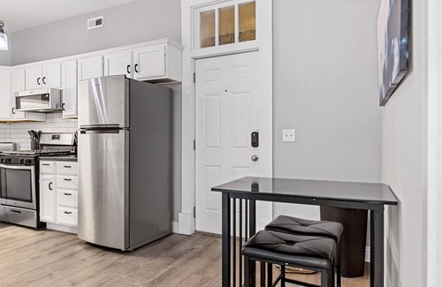 St. Charles Apartment | Main Street Balcony Apartment by StayLage!