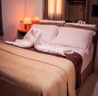 Praia do Morro Apartment | MAIOR NOTA - 2 Quartos com AR CONDICIONADOS SPLIT, Air Fryer, Wi-Fi, Disney Plus, Star Plus, HBO Max, Guarda Sol, Cadeiras de Praia, Caixa Térmica, Churrasqueira, Rede para Descanso e Chuveirão - 8 pessoas - CONFORTO Máximo - Melhor Localização!