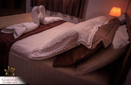 Praia do Morro Apartment | MAIOR NOTA - 2 Quartos com AR CONDICIONADOS SPLIT, Air Fryer, Wi-Fi, Disney Plus, Star Plus, HBO Max, Guarda Sol, Cadeiras de Praia, Caixa Térmica, Churrasqueira, Rede para Descanso e Chuveirão - 8 pessoas - CONFORTO Máximo - Melhor Localização!