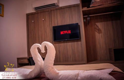 Praia do Morro Apartment | MAIOR NOTA - 2 Quartos com AR CONDICIONADOS SPLIT, Air Fryer, Wi-Fi, Disney Plus, Star Plus, HBO Max, Guarda Sol, Cadeiras de Praia, Caixa Térmica, Churrasqueira, Rede para Descanso e Chuveirão - 8 pessoas - CONFORTO Máximo - Melhor Localização!