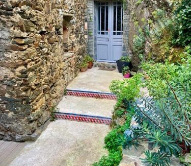 Lastours Apartment | Maison CABARET Luxury 4 Star Air Conditioned 100m to 4 Cathar Châteaux Lastours private Terrasse with views!