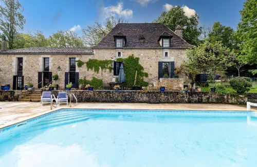 Saint-Amand-de-Vergt Bed & Breakfast | Maison Croix du sud. Chambre Fruits de la Passion