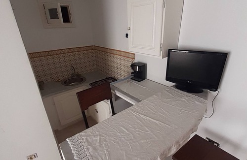 Borj Erras House | Maison d'hôte Albatros Guest room with private bathroom and court view