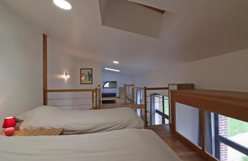 L'Aigle Apartment | Maison de charme : piscine, sauna, salle de jeux, studio en option, idéal pour détente et sport - FR-1-497-140