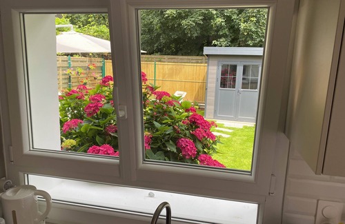 Domont House | Maisonette with garden