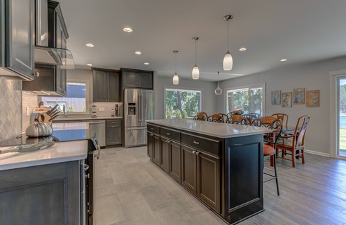 Post Falls House | Majestic Riverfront Family Retreat