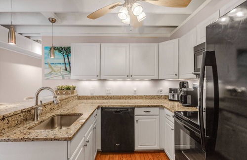 Selbyville House | Mallard Lakes townhouse with hot tub, pool, water views, & fireplace