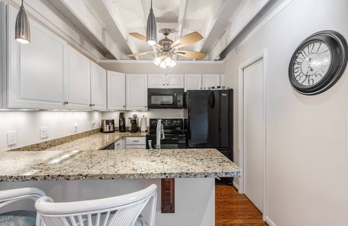 Selbyville House | Mallard Lakes townhouse with hot tub, pool, water views, & fireplace