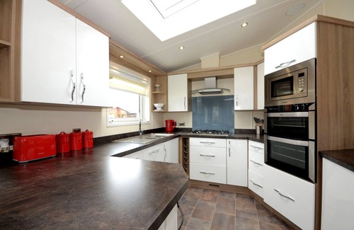 Malton Cabin | Malton Grange - Victory Greenland Luxury Lodge with hot tub. Rural views.