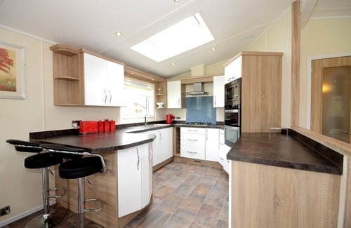 Malton Cabin | Malton Grange - Victory Greenland Luxury Lodge with hot tub. Rural views.