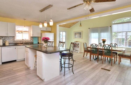 Tranquil Harbour House | Mandolin Wind your family beach getaway. n5 minute walk to the beach. 10% off