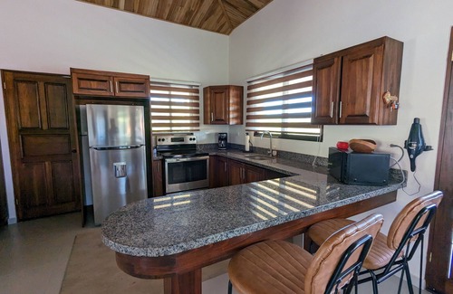 Escobal House | Mango Sunrise Retreat Modern 3-Bedroom House AC Mountain Views Saltwater Pool