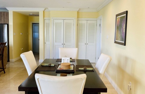 Cotton Ground Condo | “Mango” - Vibrant Condo Yards from BEACH at Hamilton Beach Villas & Spa