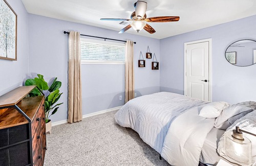Spring Branch West House | Mapleton Place | House in Houston with fireplace, patio, & W/D