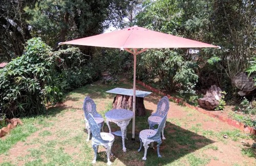 Ooty Villa | Maplewood Cottage, Ooty by Ebony Stays | Luxury 6BHK with Lawn & Mountain Views