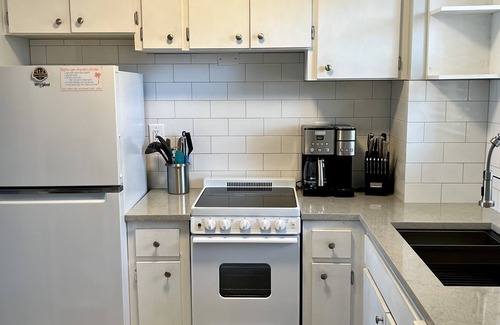 Marco Island Condo | MarcoView 402 - A Slice of Paradise! Premier Waterfront Location @Anglers Cove!