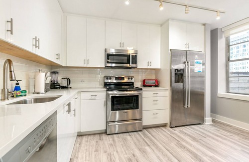 Central Business District Hotel | Mardi Gras Suites NOLA's 4BR Elegance