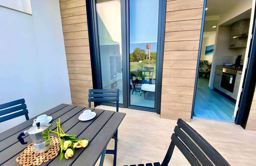 Torre Grande Apartment | Mare Dentro - Modern Apartment with Terrace for Families Near the Beach