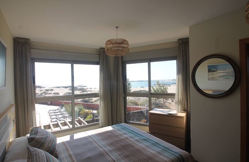 Los Lagos Apartment | Marfolin 1 El Cotillo. Beachfront apartment with direct access to pool & beach