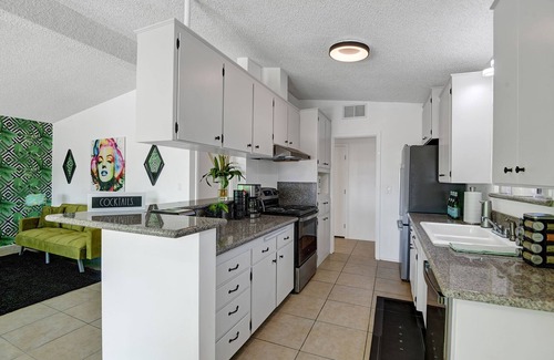 Desert Hot Springs House | Marilyn's Secret - Mid Century Modern Black House