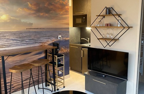 Pirou Apartment | Marine Blue Apartment Terrace and Sauna