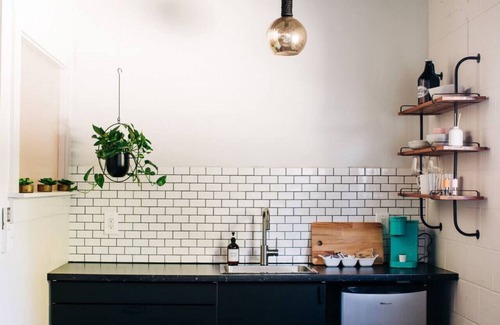 East Market District Apartment | Market #6 · Stellar Suites | Ruby King Suite in NuLu | Bikes
