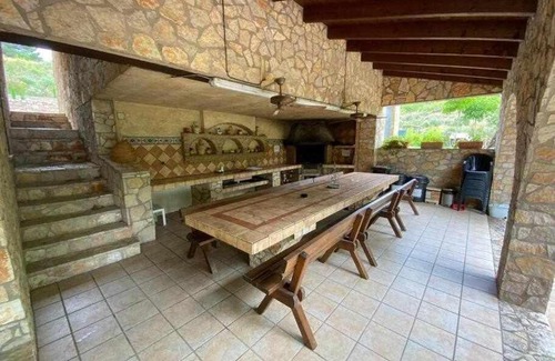 Riudecols House | Masía de piedra con piscina