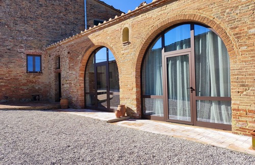 Bollano House | Mascagni farmhouse among the olive trees and the Tuscan hills in the Val d'Orcia