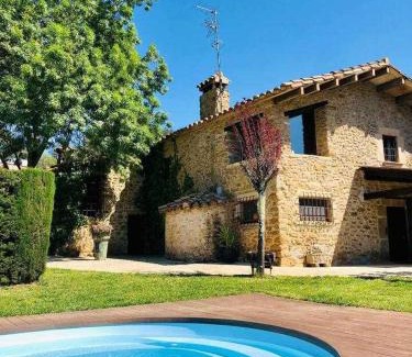 Sant Marti de Llemena Girona House | Masia with pool and beautiful views near Girona