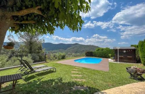 Sant Marti de Llemena Girona House | Masia with pool and beautiful views near Girona