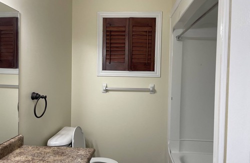 Guelph House | Master Bedroom with ensuite Bathroom & Closet. Kitchen and living are shared.