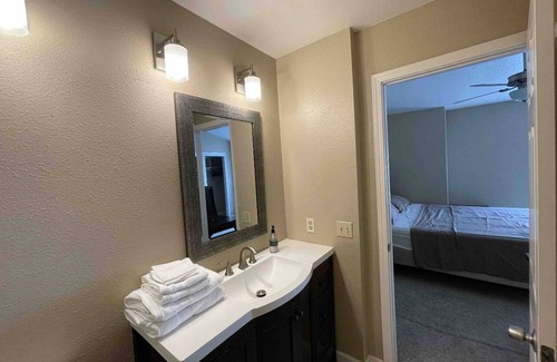 Stockton Condo | Master Bedroom With Private Bathroom