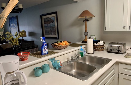 Point East Condo | Master Suite KING SIZE BED, Guest bedroom two FULL SIZE beds. Family discounts.