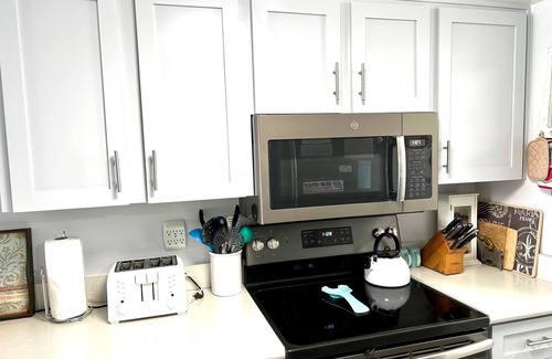 Point East Condo | Master suite KING SIZE bed, Guest Bedroom two FULL SIZE beds. BIG Discounts!