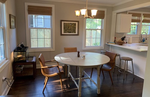 Pendleton King House | Masters rental with spacious back porch, fenced in yard, and park frontage.