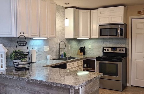 Matagorda Cottage | Matagorda town side River front night light onDock Family beach & fishing trips!