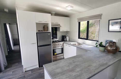 Matakana House | Matakana Puri Retreat. Cozy and comfortable pet friendly accommodation.