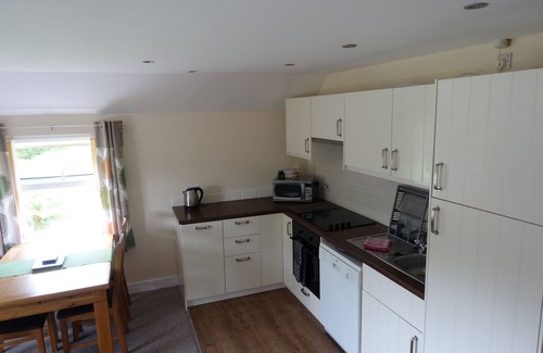 Tavernspite Apartment | MAY COTTAGE - family friendly with stunning lakeside views