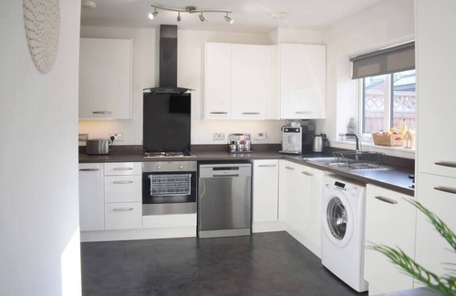 Broadheath Condo | Maya Boutique Inn - Garden - Sleeps 6
